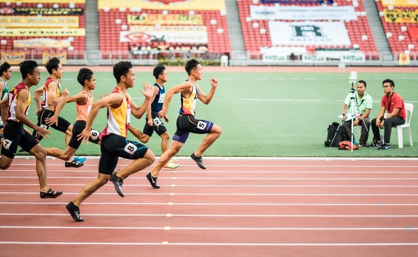 Athletes running on a track