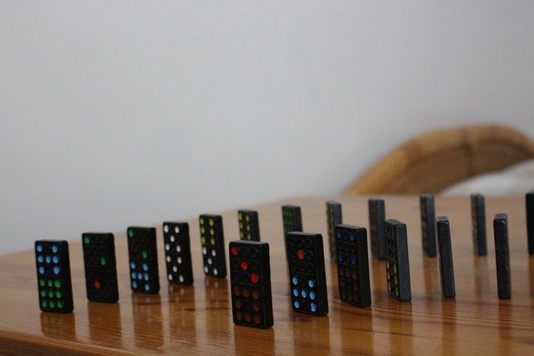 Dominos lined up on a table