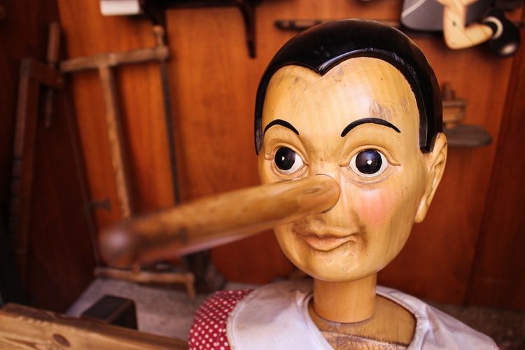 Wooden Pinochio puppet with long nose