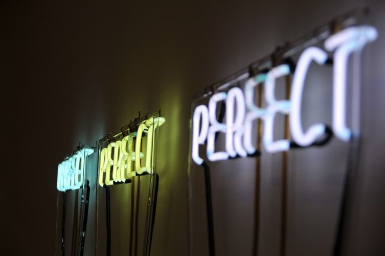 Neon sign saying 'perfect'