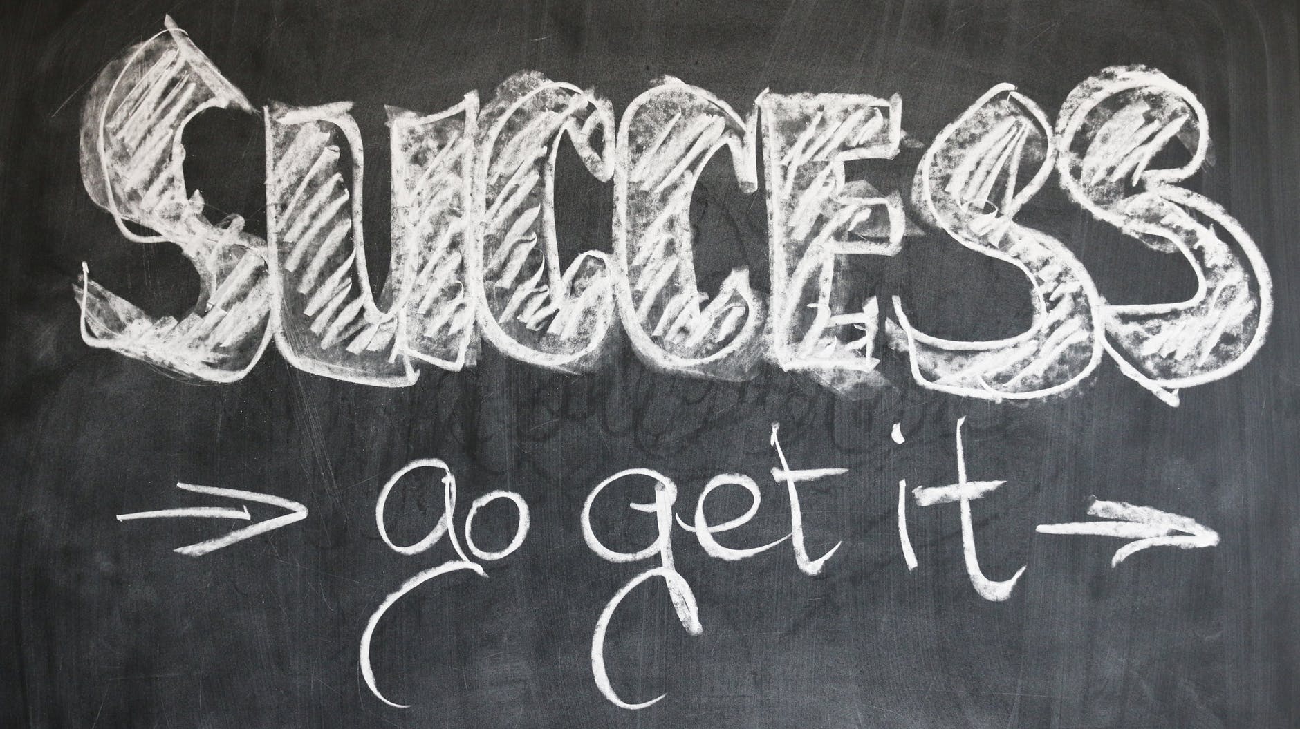 'Success go get it' written on a chalkboard
