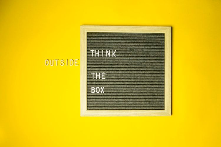 Picture frame with 'think outside the box'