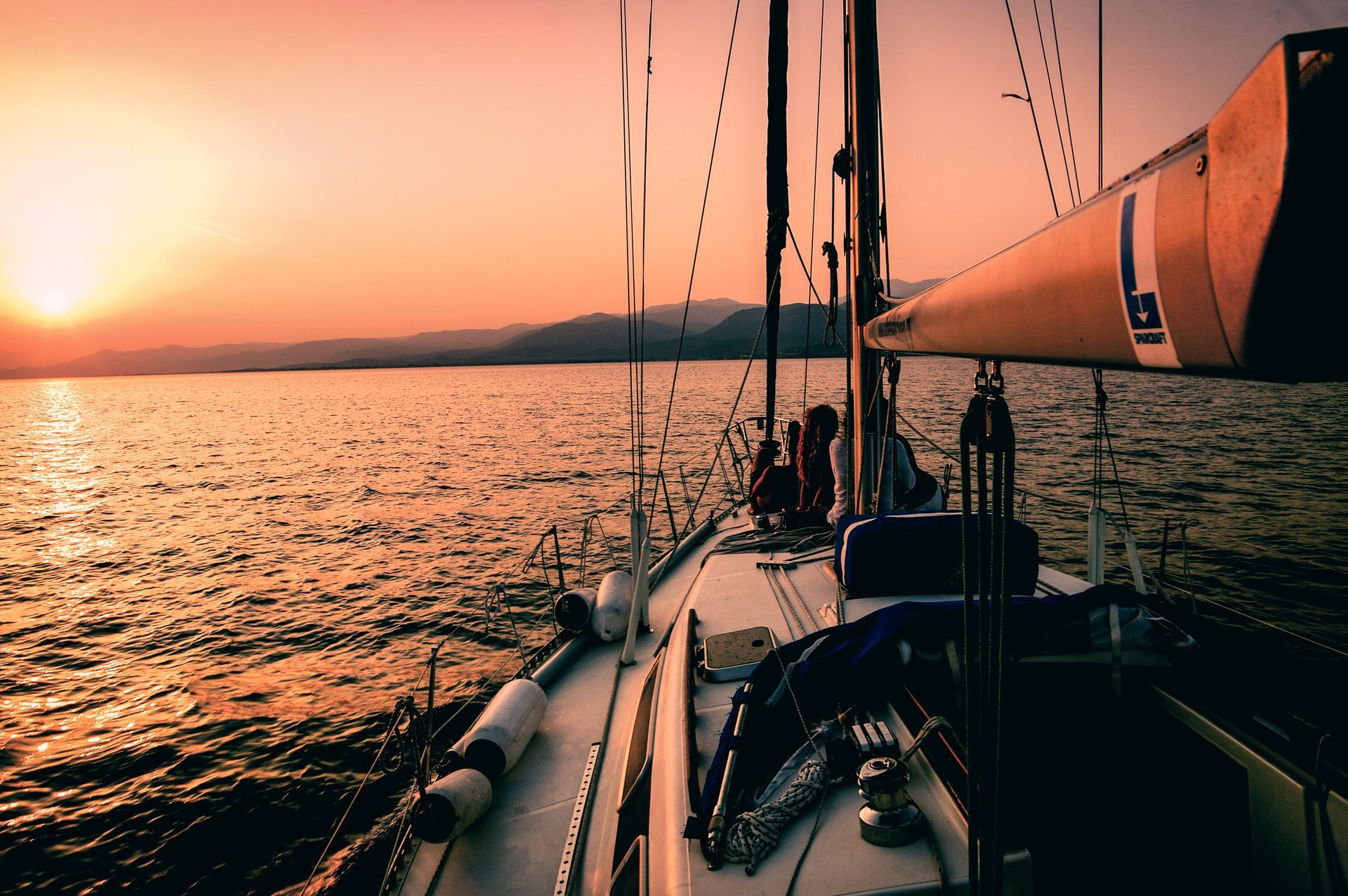 A sailing yacht at sunset