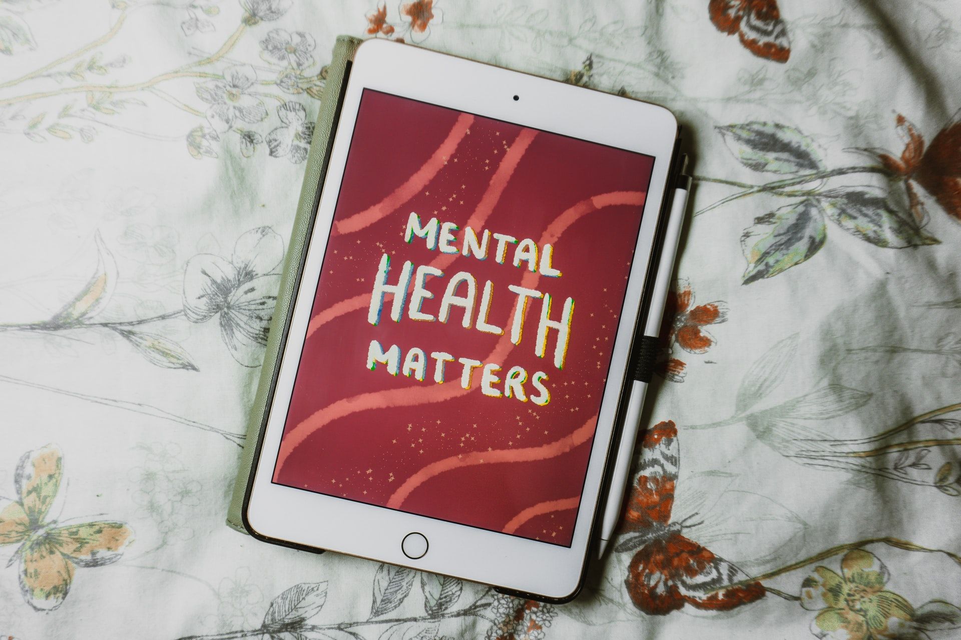 The words 'mental health matters' on an iPad screen