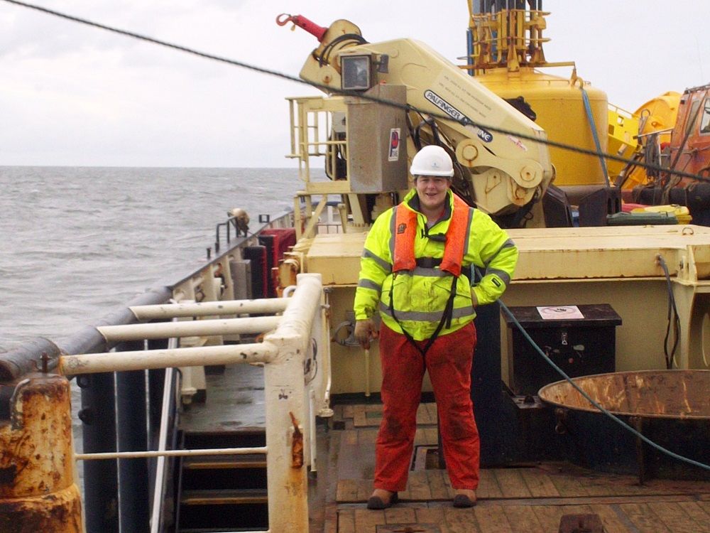 Seafarer on deck in hi vis gear