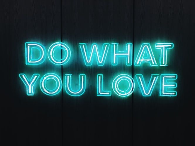 Neon sign saying 'do what you love'