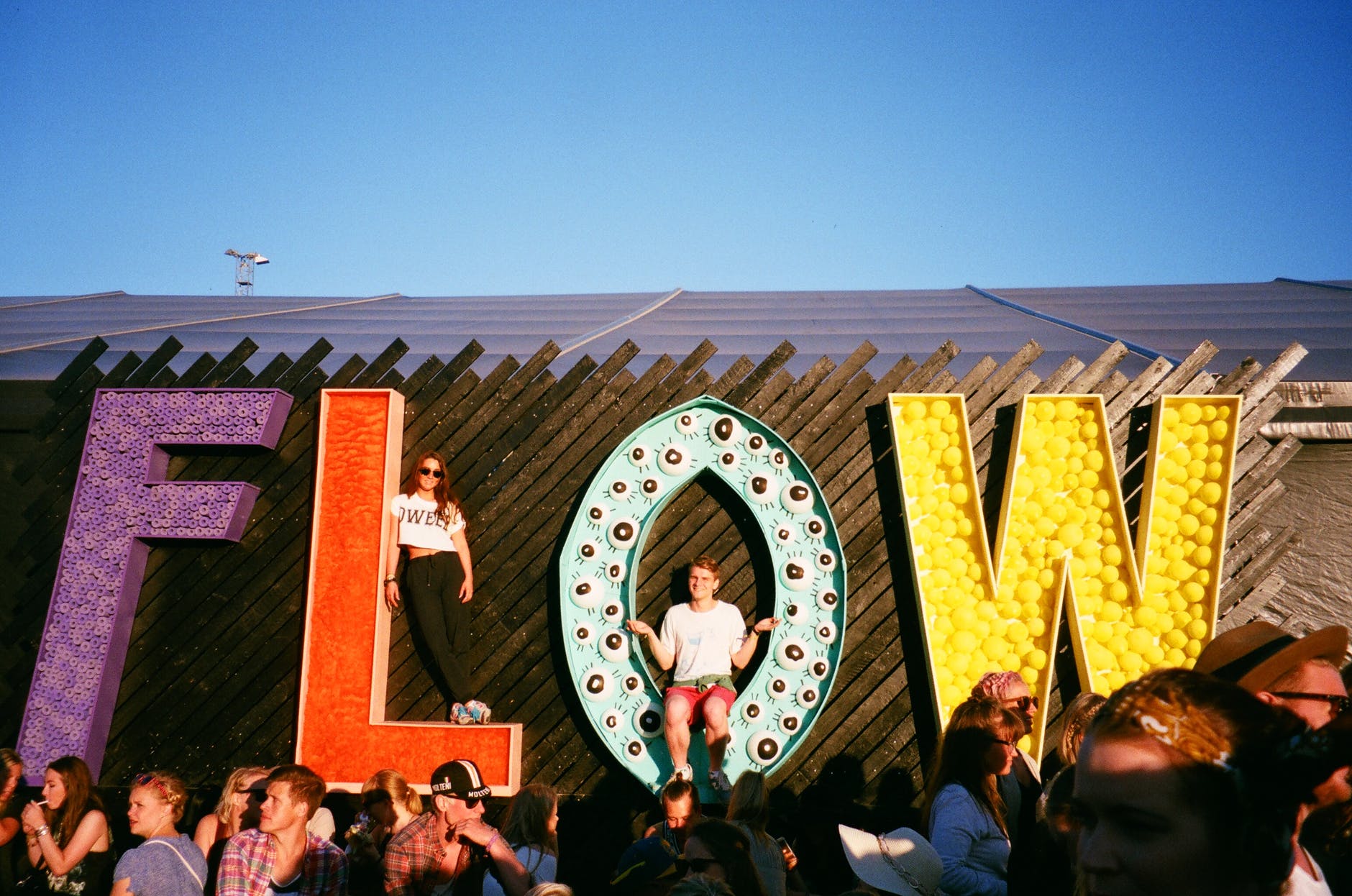 The word flow in giant letters at a festival