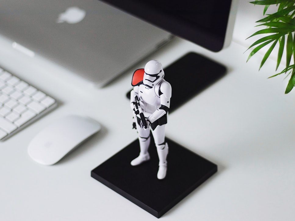 Stormtrooper figure guarding a laptop