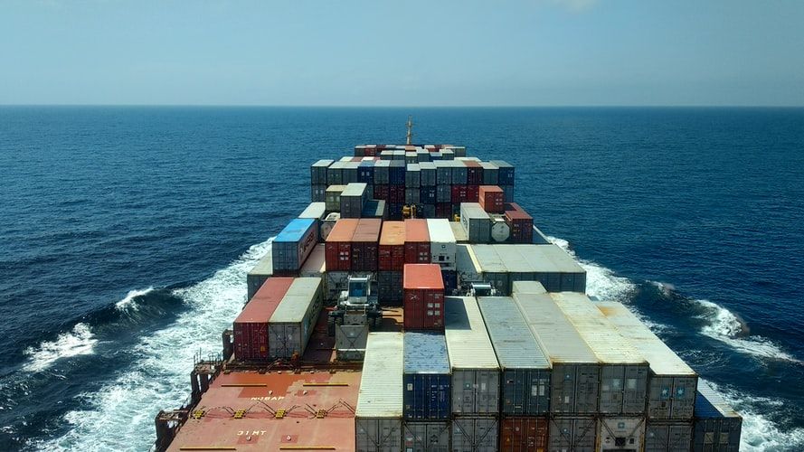 View over a container ship from the bridge