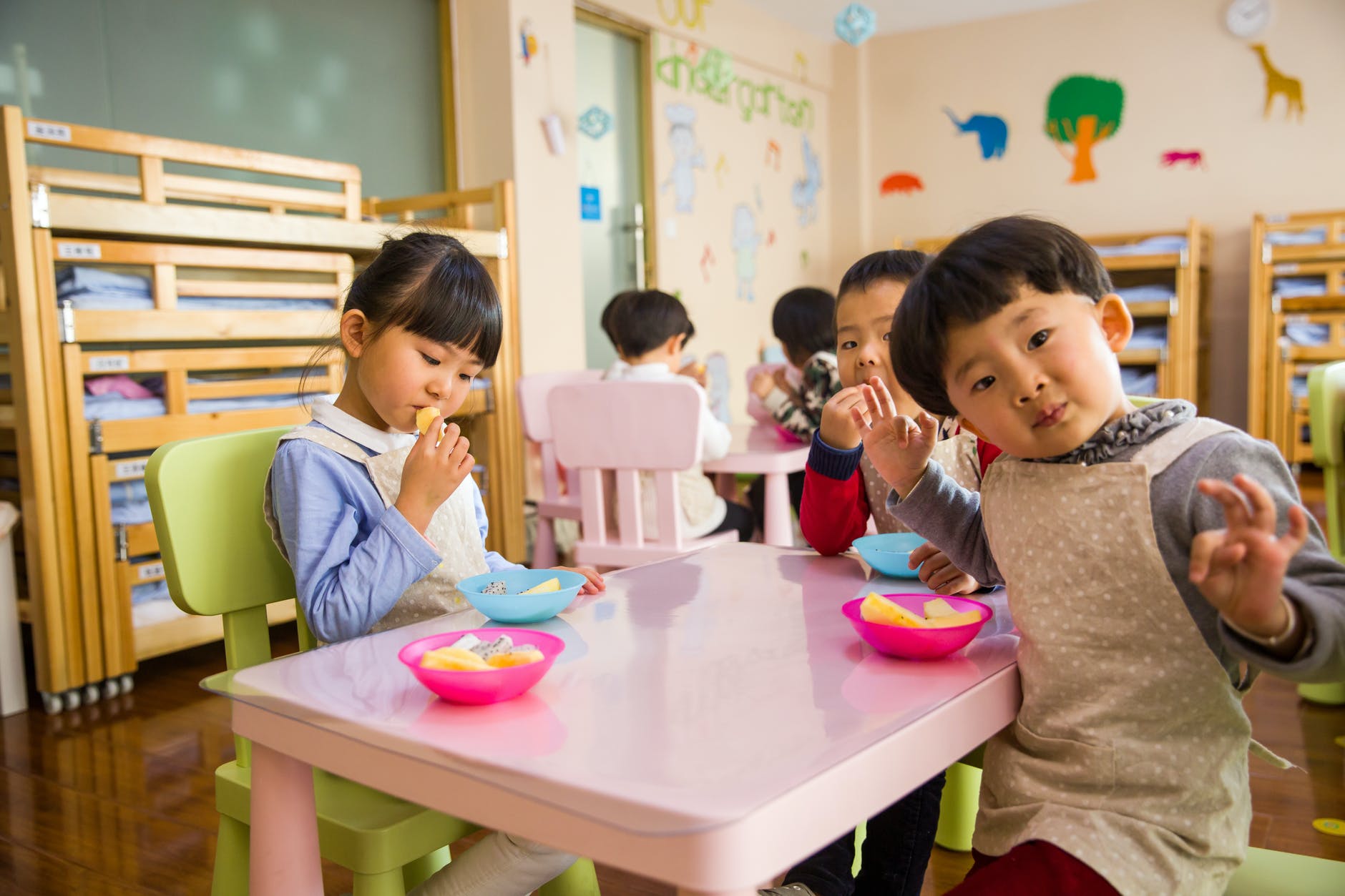 Children in a kindergarten eating a snack