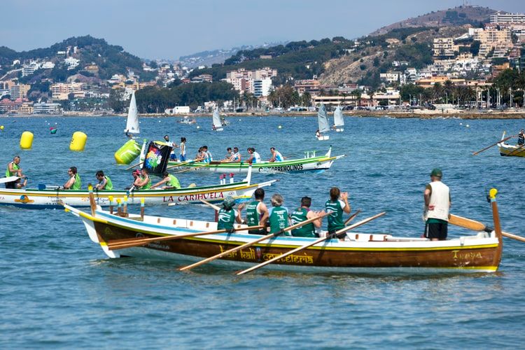 Boats competing in a rowing regatta