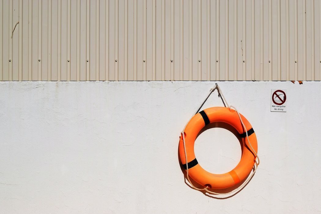 Life buoy hanging on a wall
