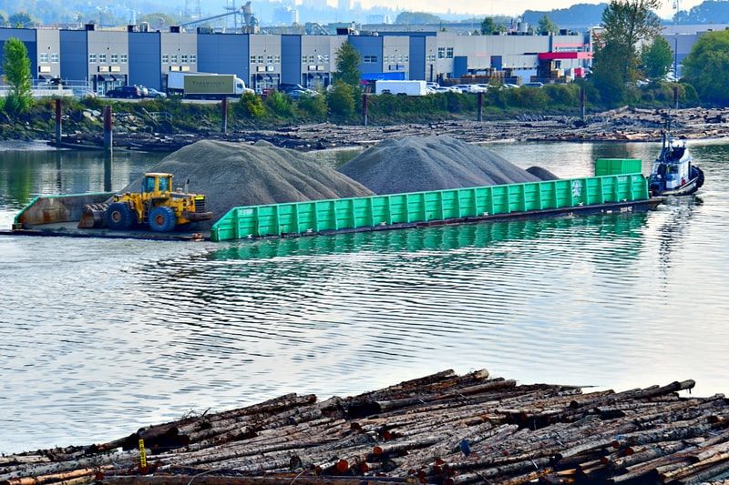 A roll-on roll-off barge carrying gravel