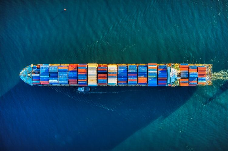 Aerial drone view of a container ship at sea