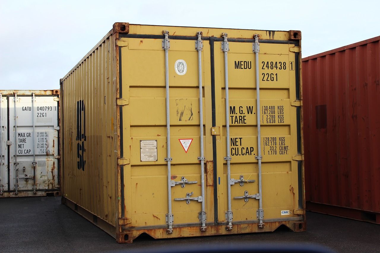 A yellow shipping container