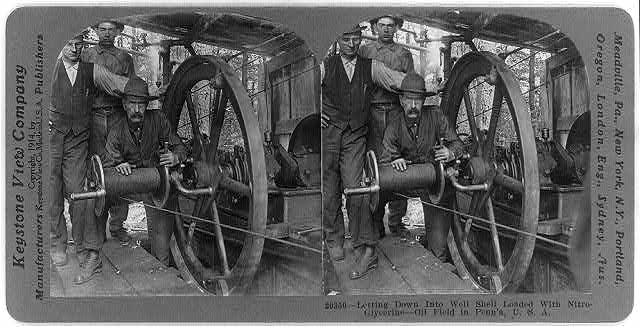 Vintage photograph of men operating machinery