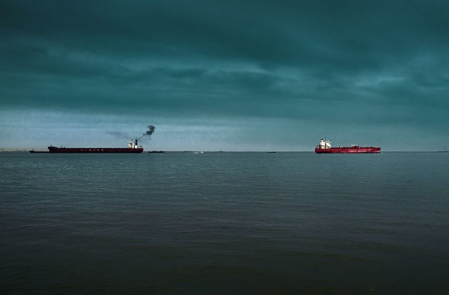 Two tankers under a grey gloomy sky