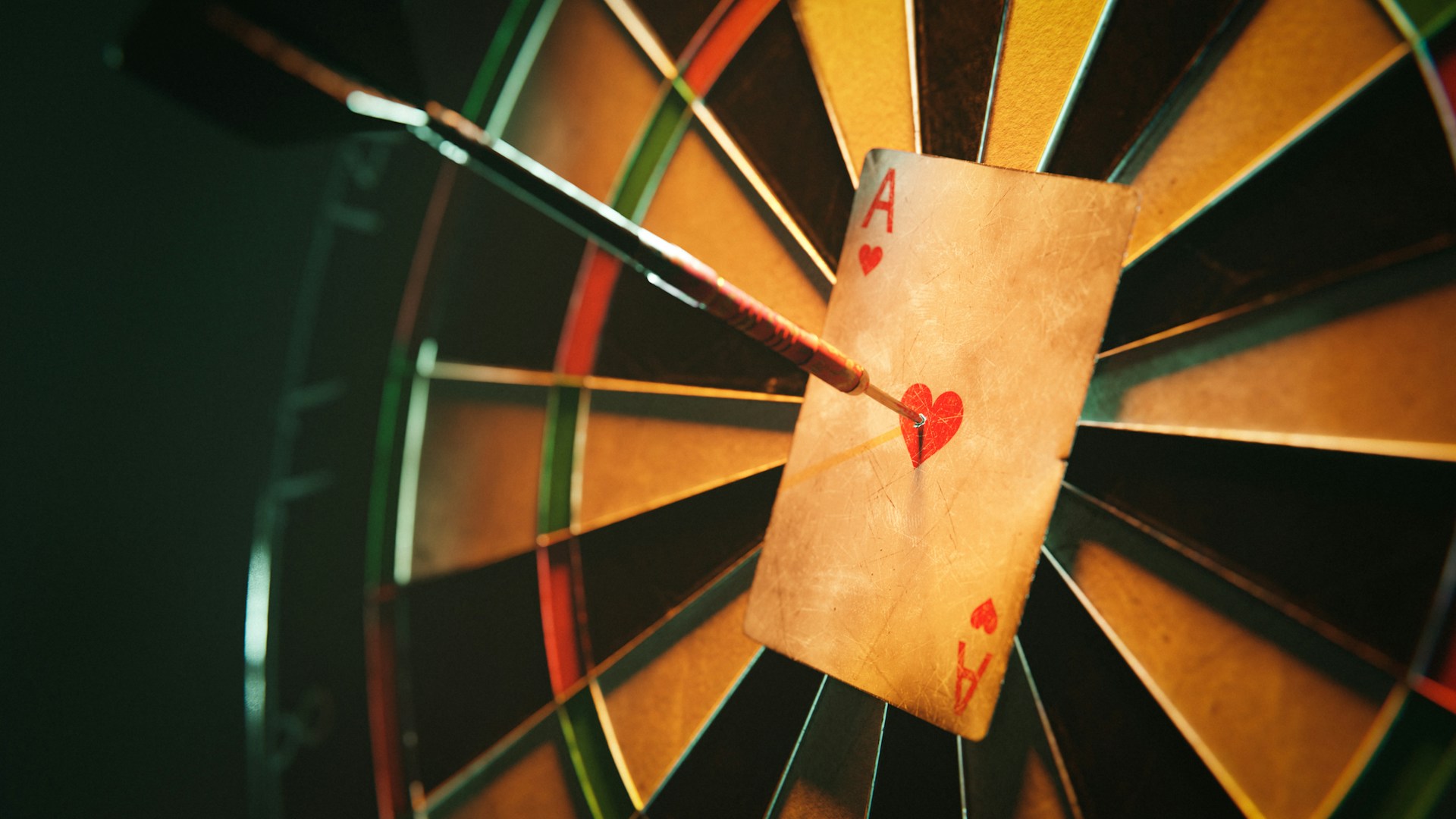 A darts board with an Ace of Hearts card on the bullseye