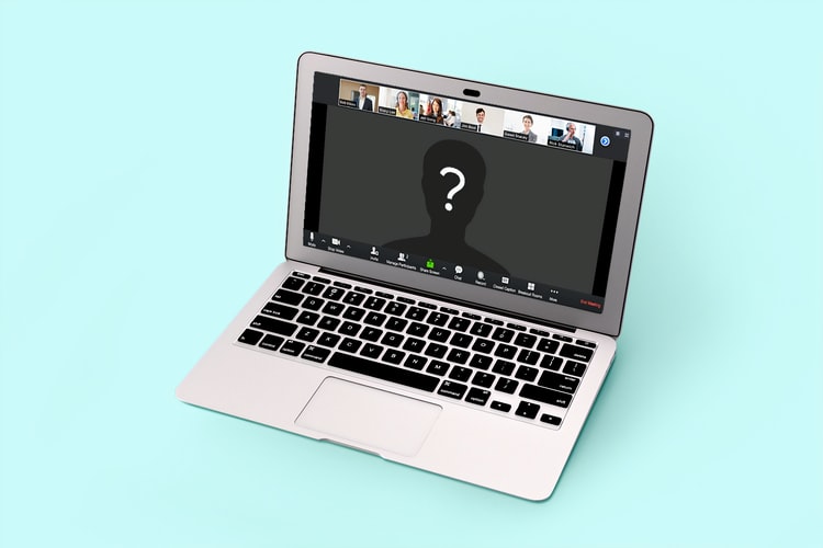Laptop with a faceless profile icon with a question mark on it