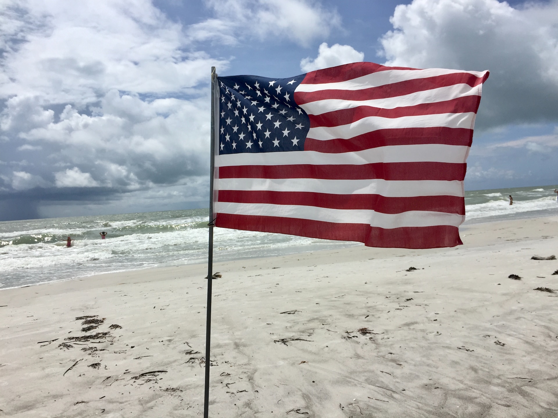 the U.S. Stars and Stripes flag on a beach