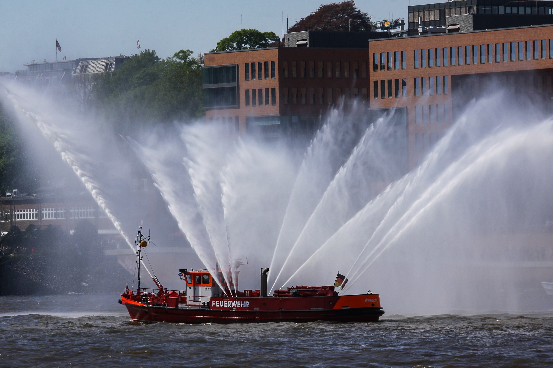 a fireboat in action spraying water