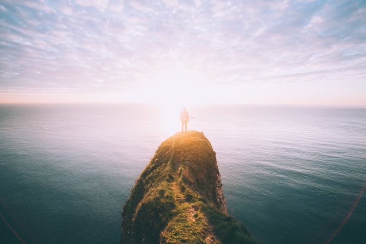 a rock and the ocean