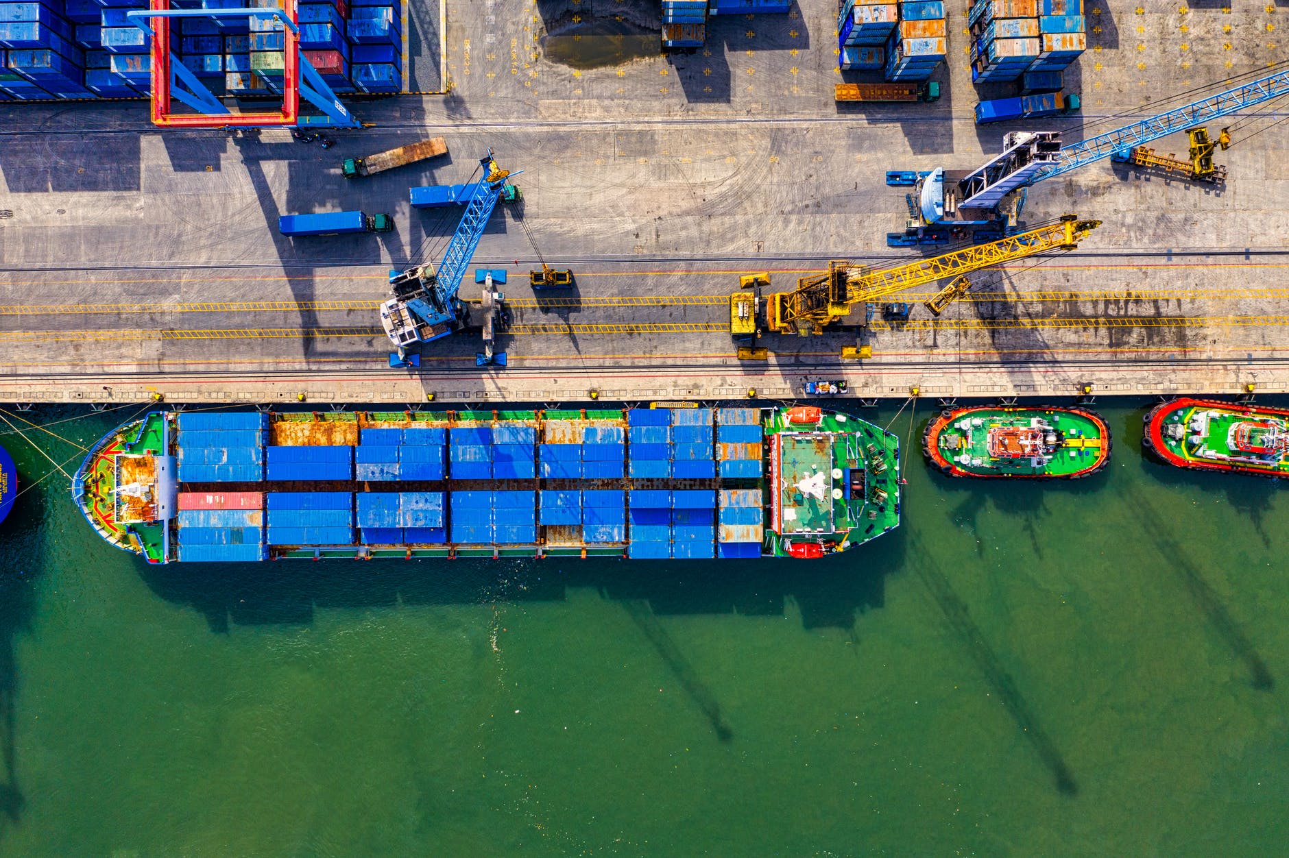 an aerial view of a cargo ship with containers in its hold