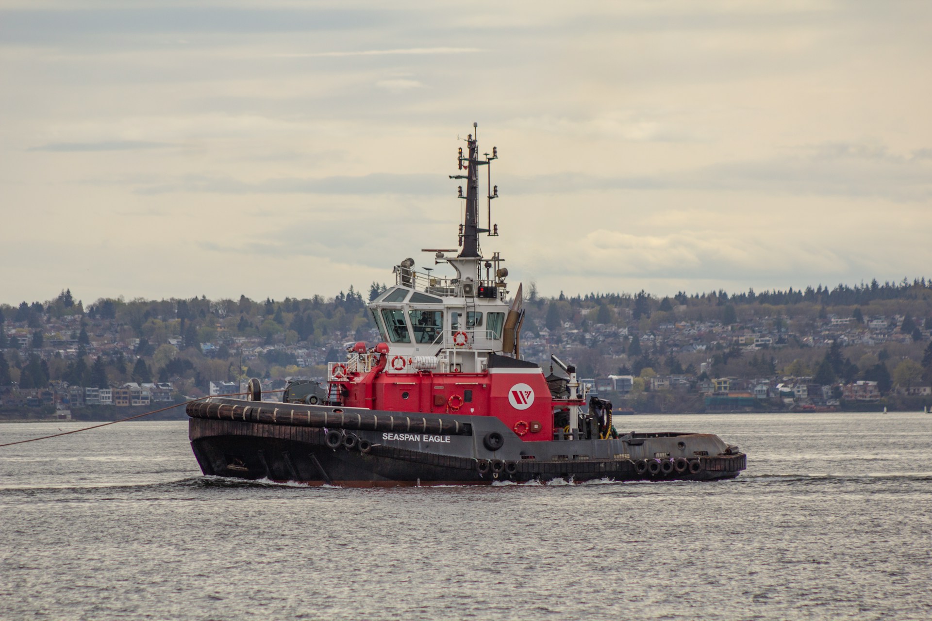 a tugboat heading to or from port