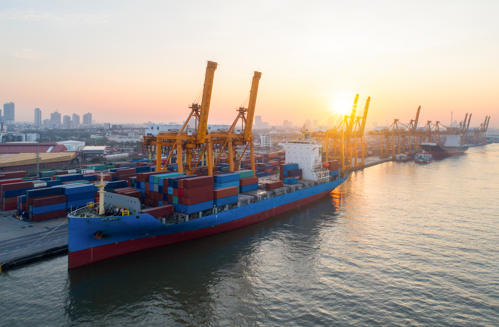 a small container ship in a port