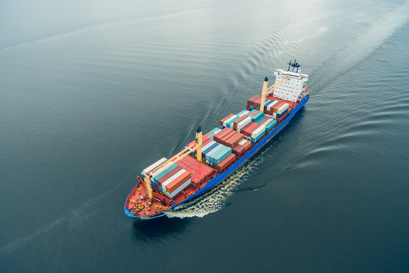 a drone view of a container ship at sea