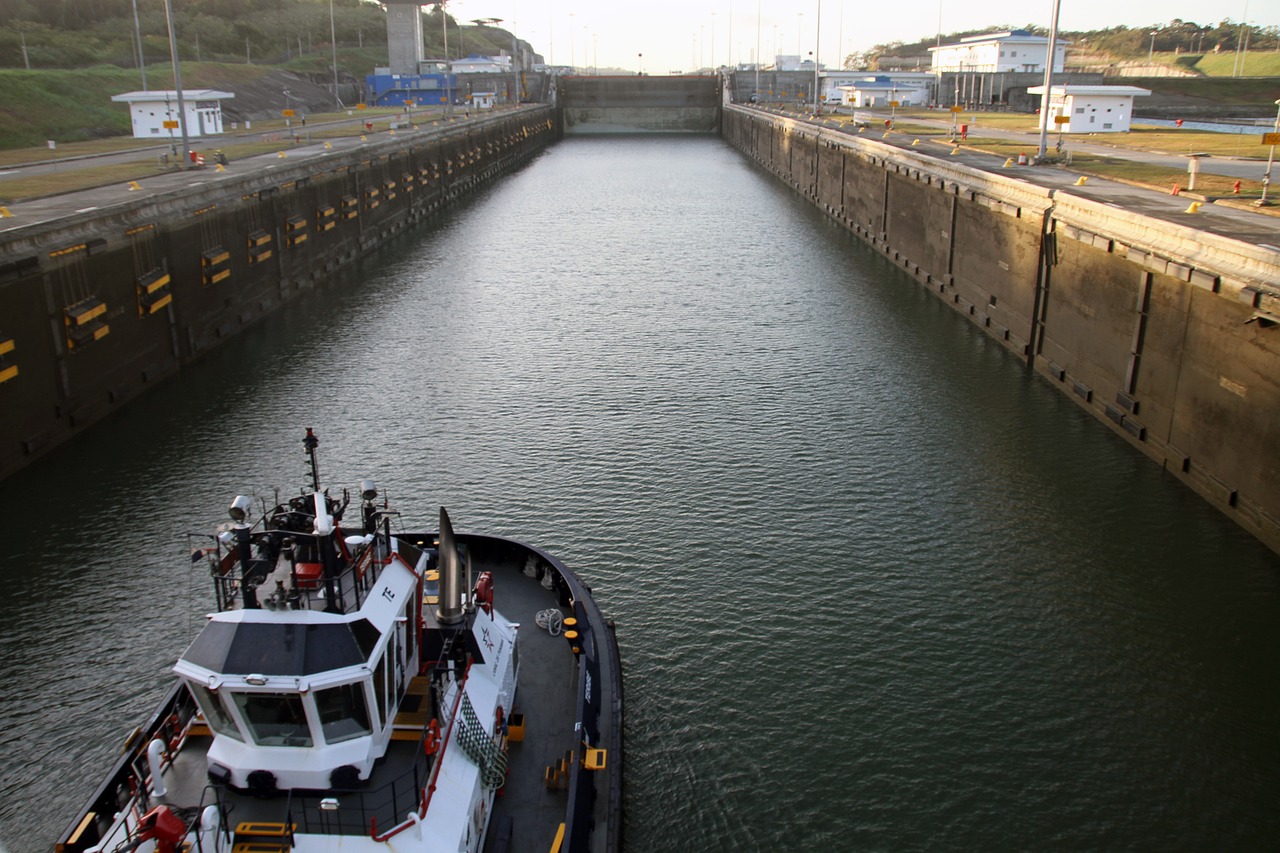 a tugboat passing through the Panama Canal