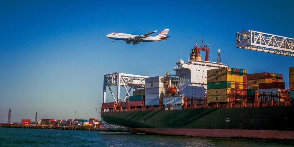 container ship and plane