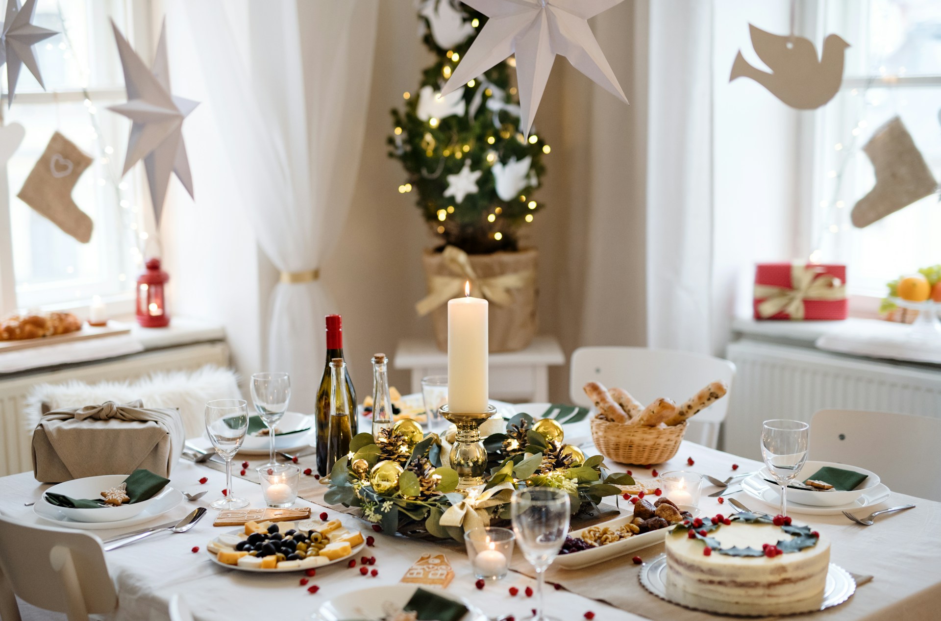 a table set for Christmas dinner
