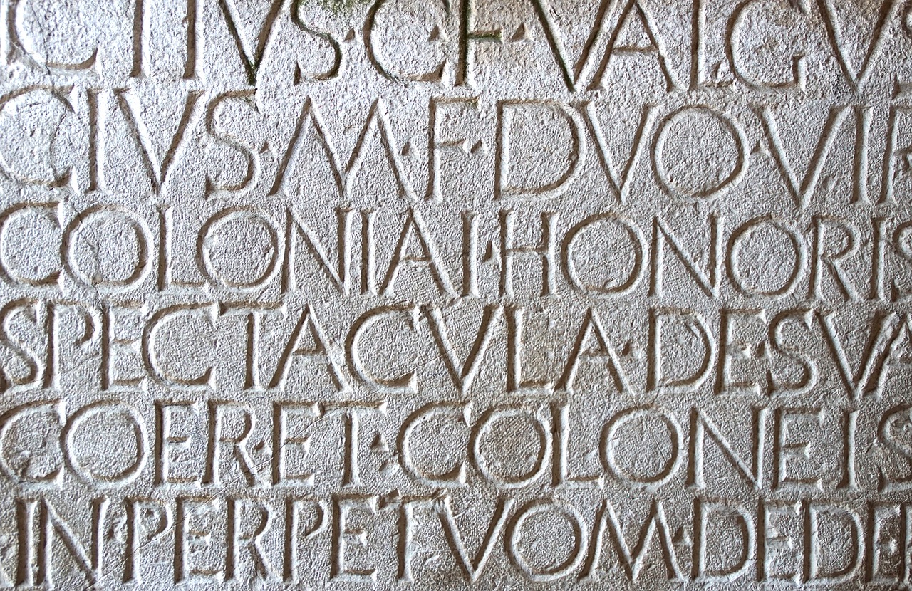 Latin writing carved in stone