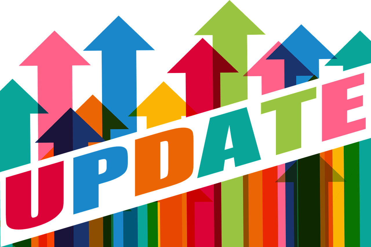 Illustration of colorful arrows pointing upwards and the word 'update'