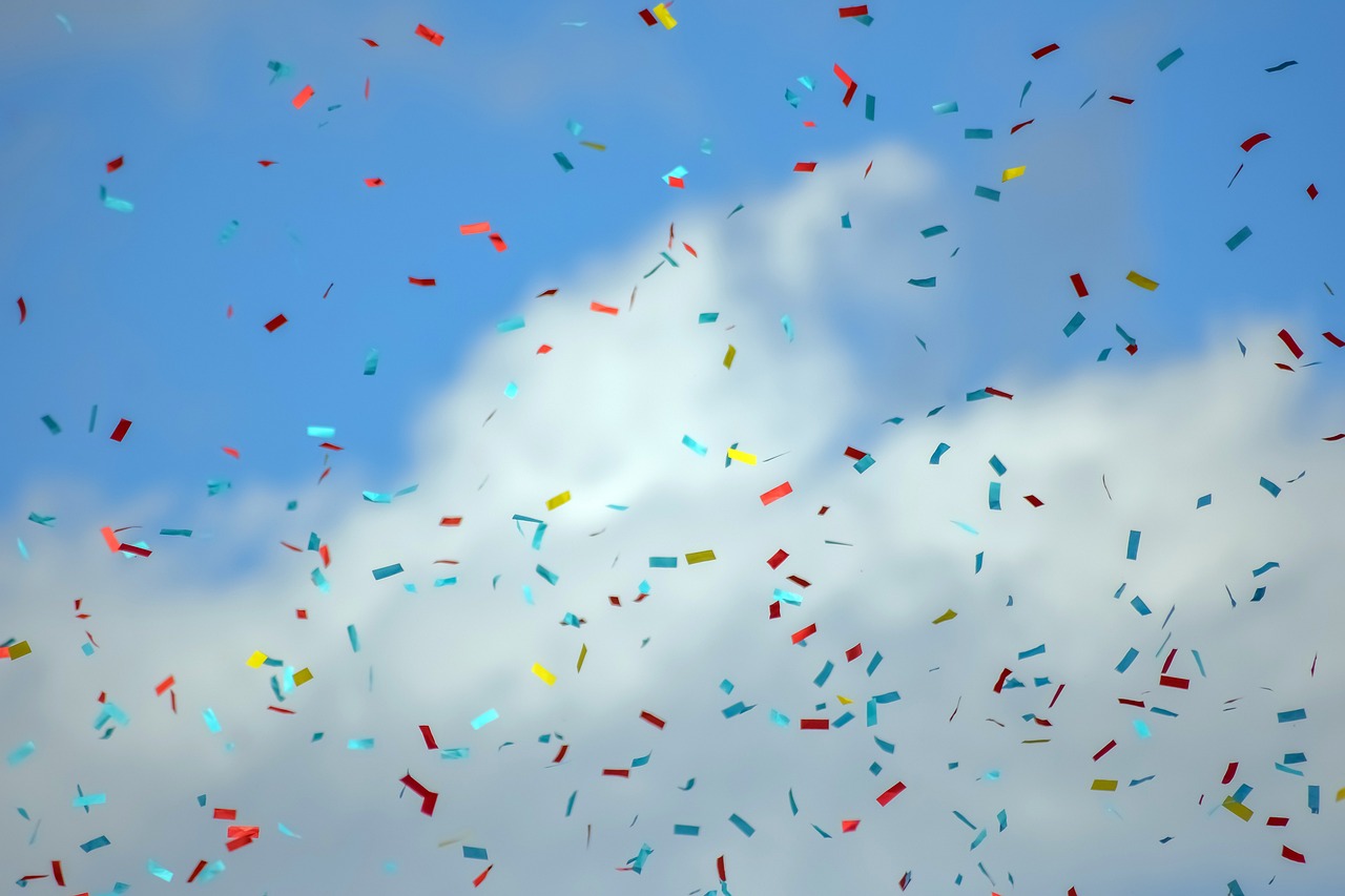 confetti against a blue sky