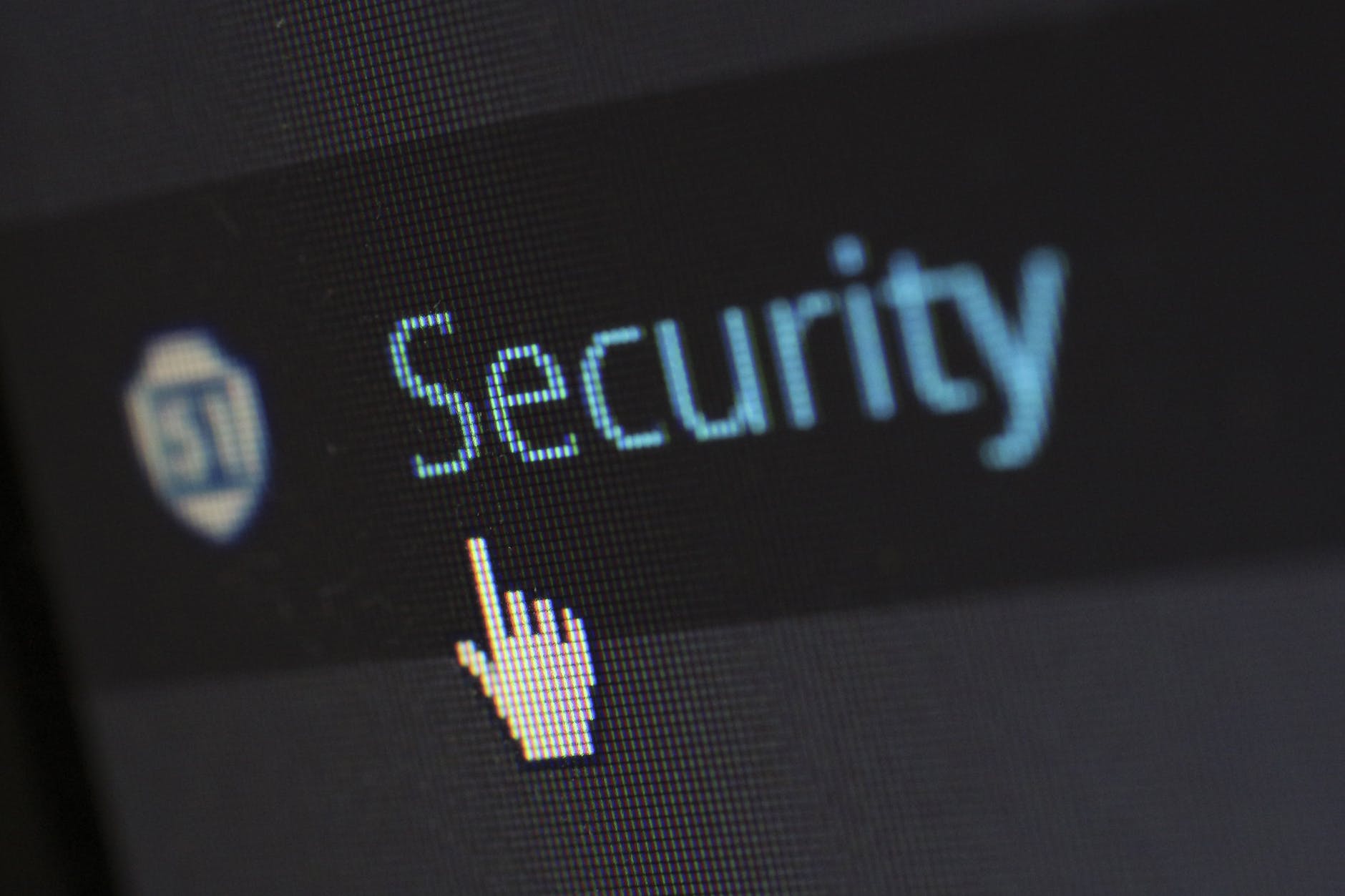 cursor on a screen pointing at the word security