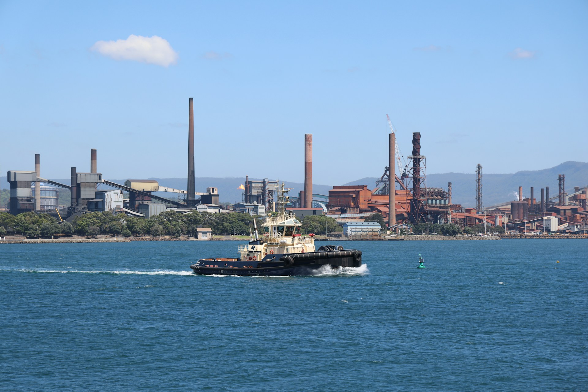 A tugboat in an industrial Australian port