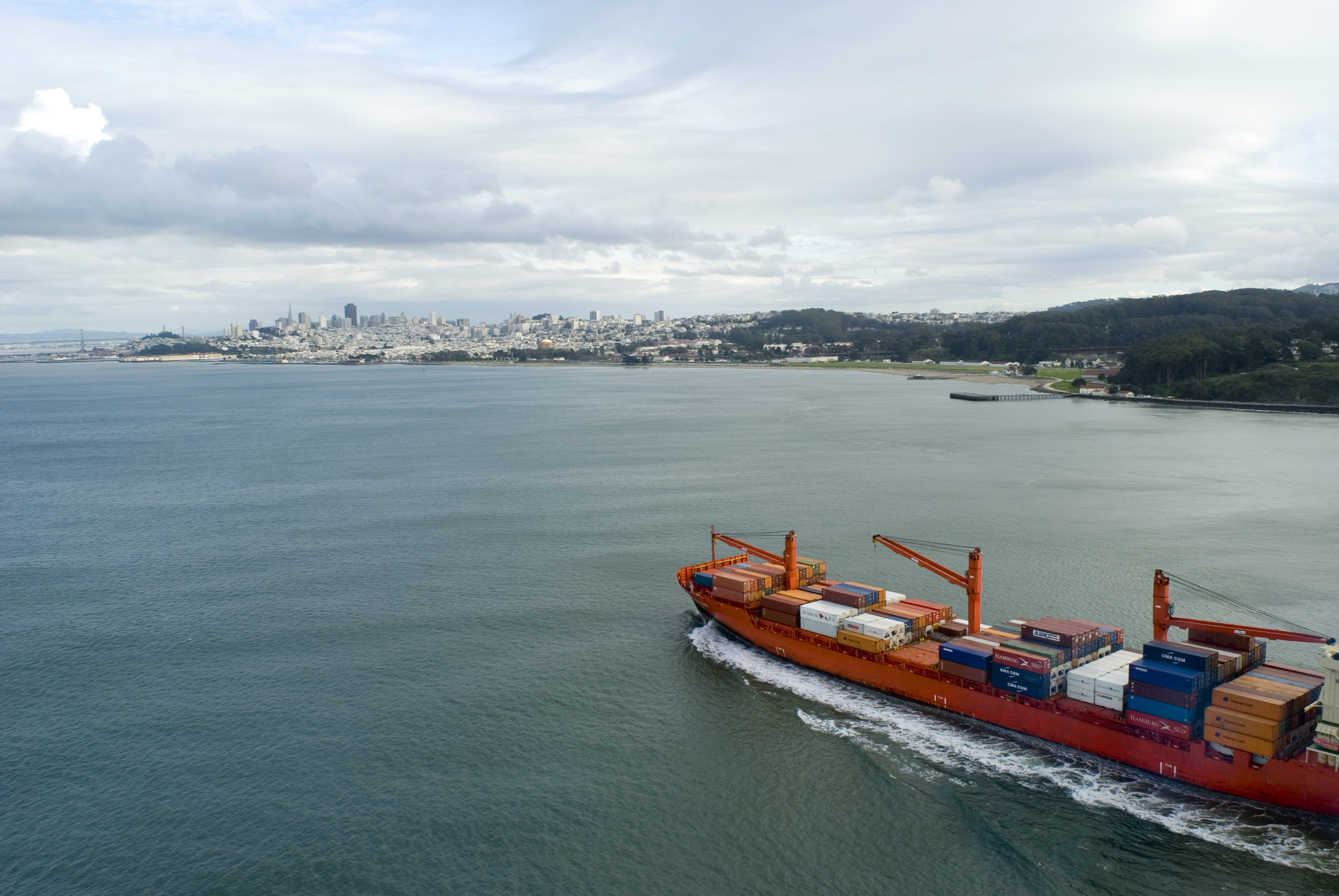 A cargo ship heading towards port