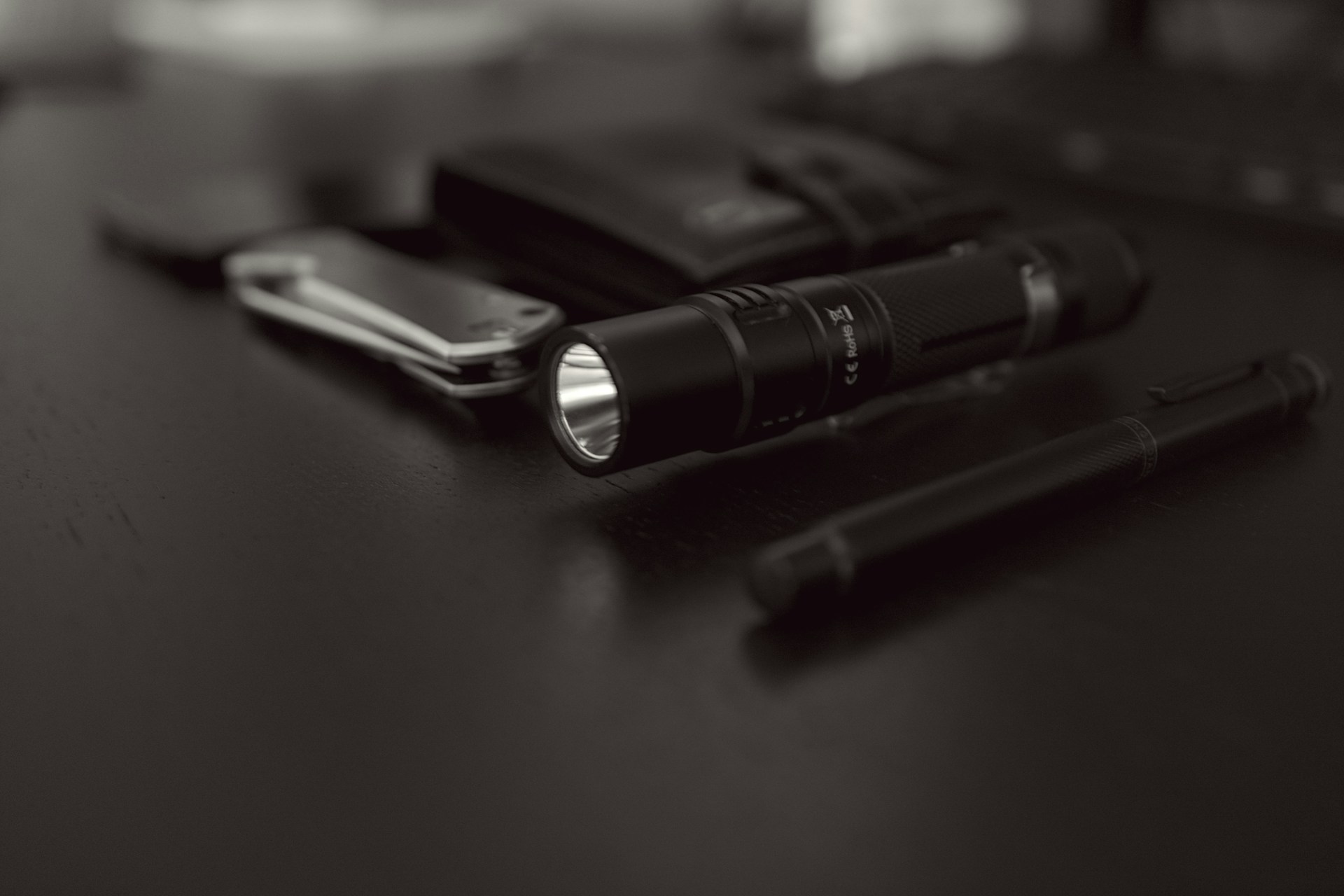 a pen and a flashlight