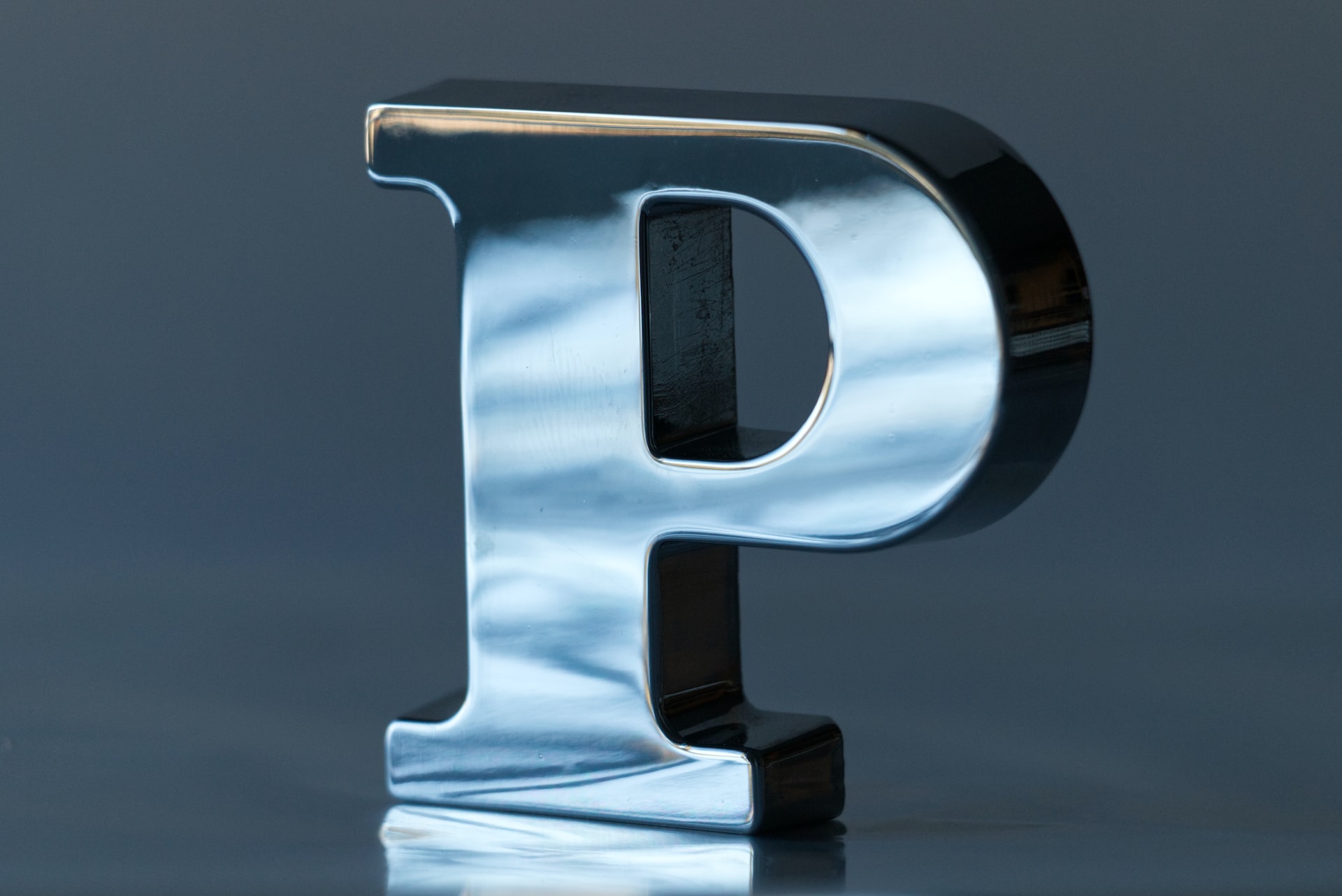 the letter P made from metal 