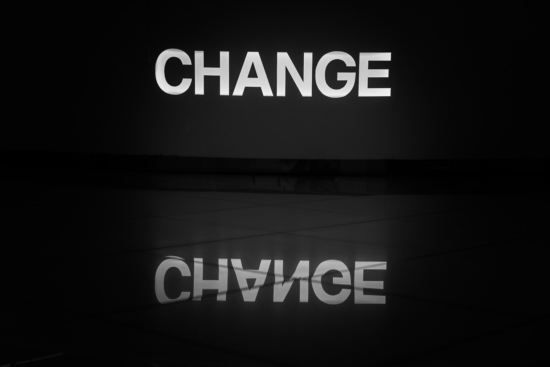 A black background with the word 'change' on it