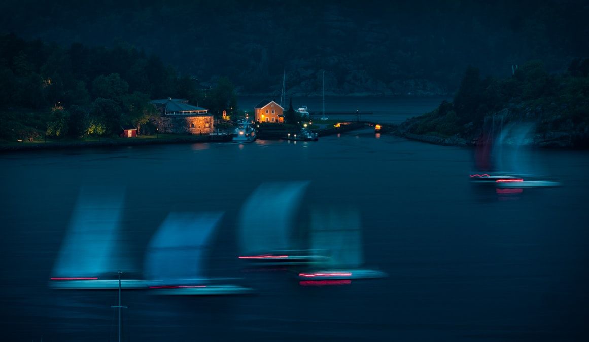 blurred speeding boats