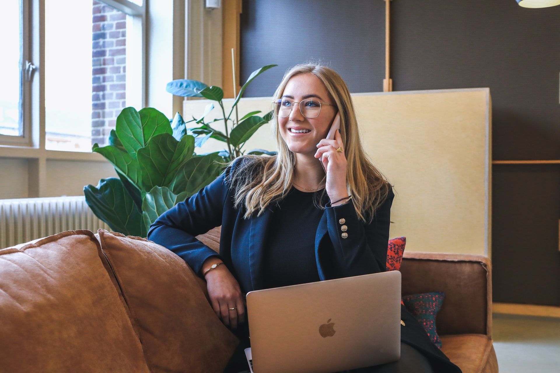 smiling businesswoman on phone