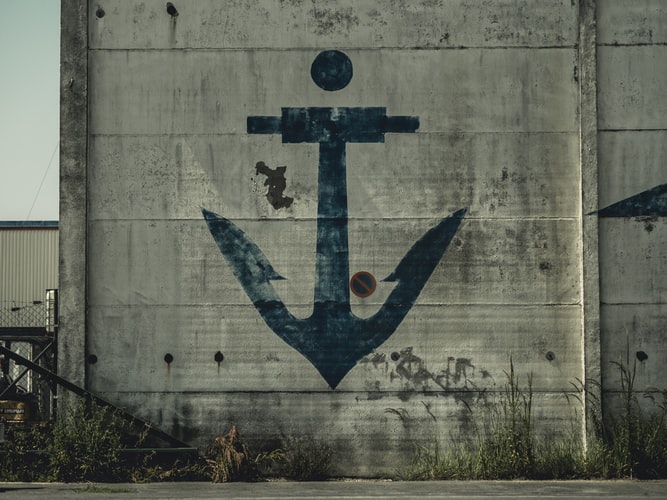 an anchor stenciled on a wall