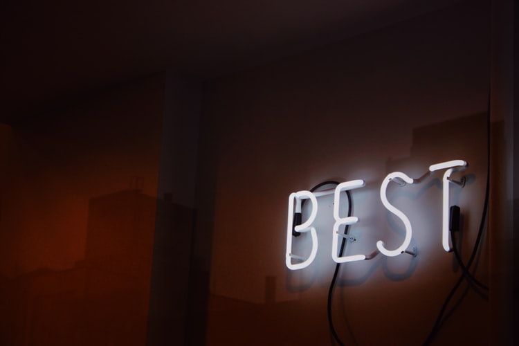 neon sign saying 'best'