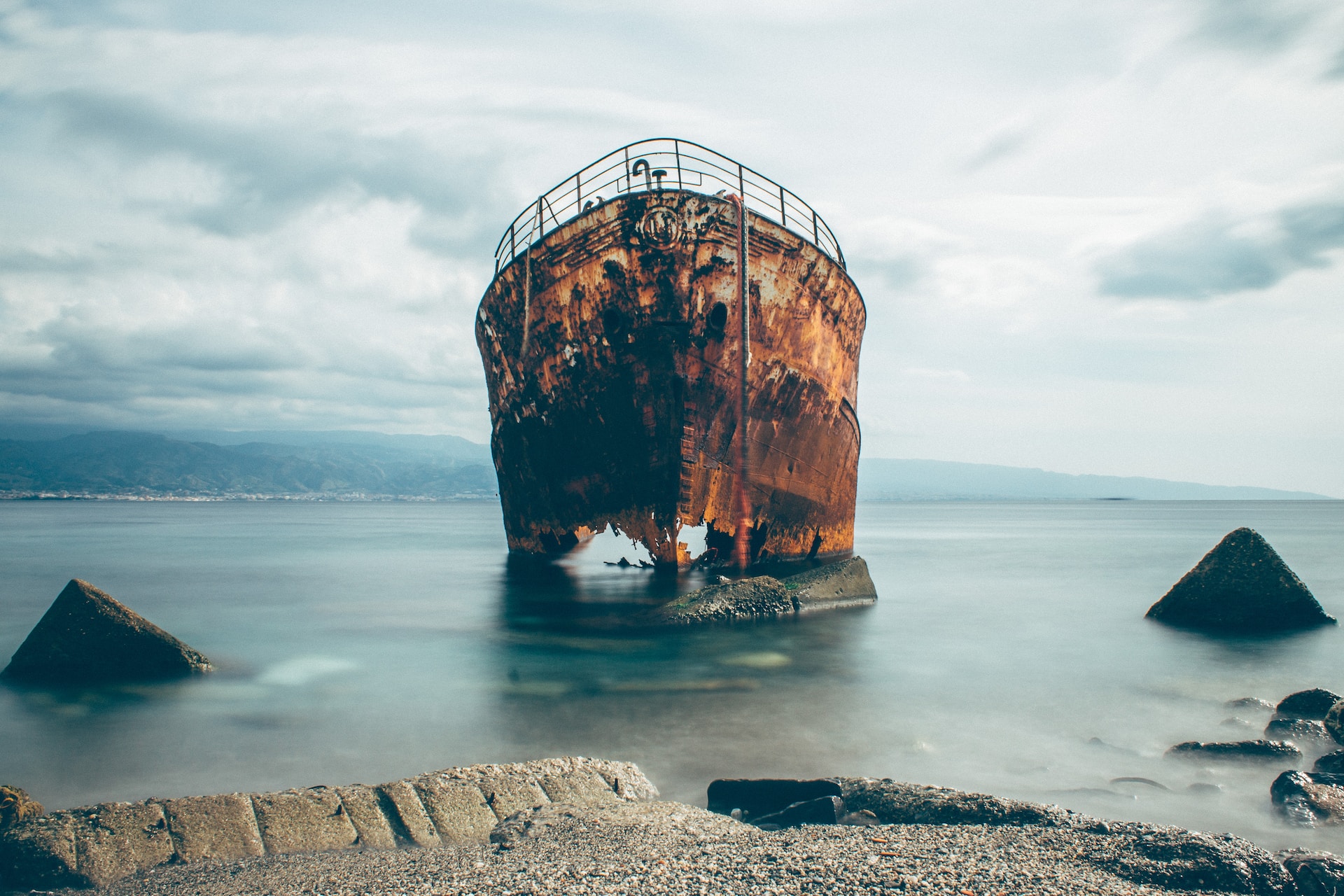 the rusty hull of a  ship
