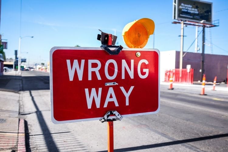 sign saying wrong way