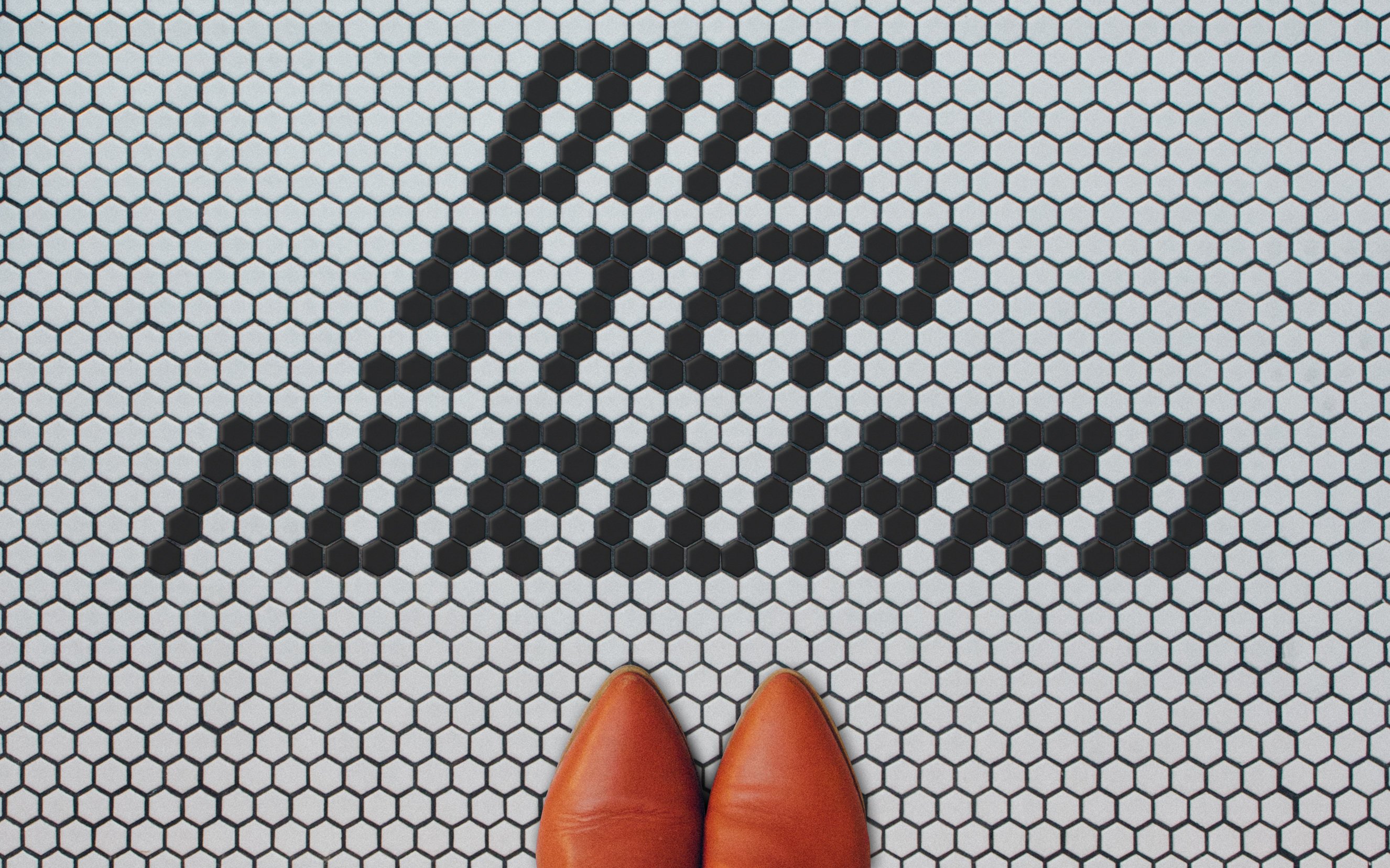 a tiled floor that says 'one step forward'