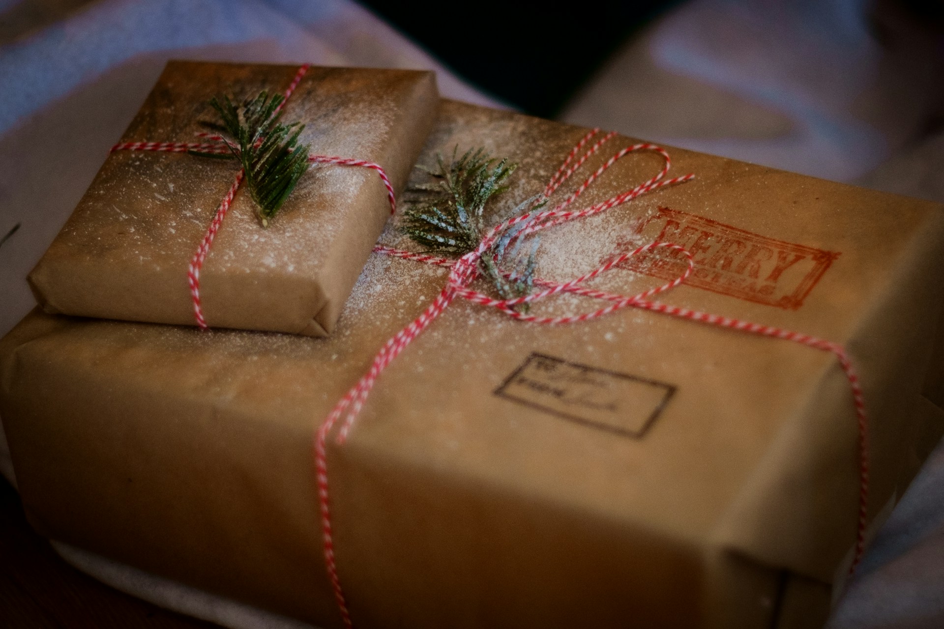 Christmas gifts wrapped in brown paper